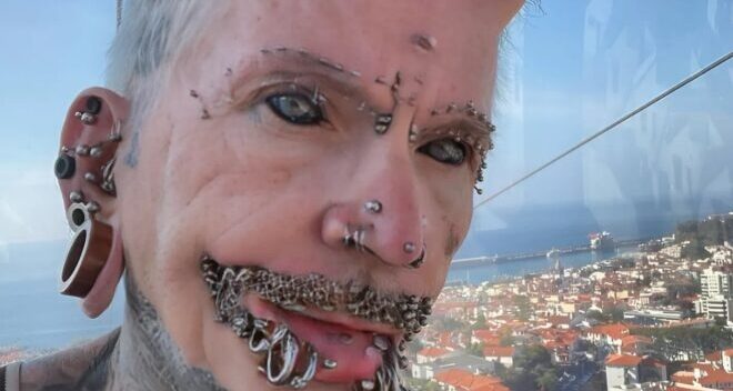 From Quiet Office Worker to World Record Breaker: The Incredible Transformation of a Man with 560 Piercings